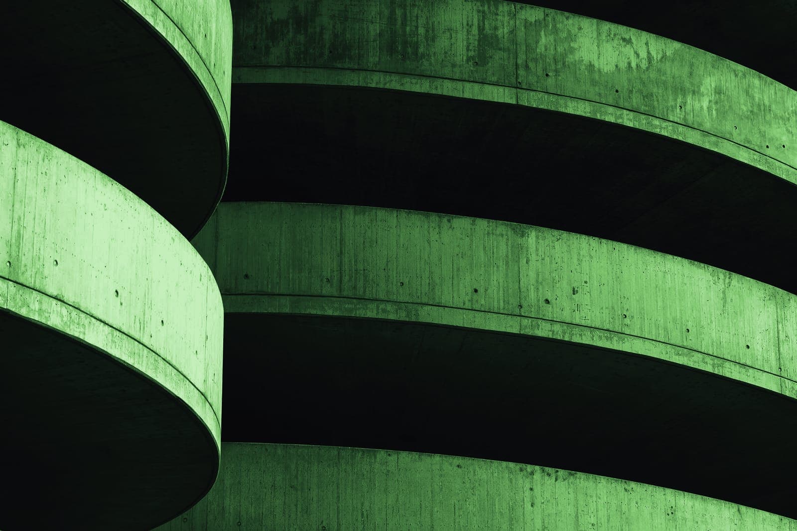 A sweeping curved concrete facade